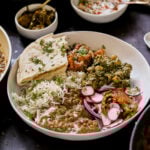 plateful of food from the diwali party menu with flatbread on the side