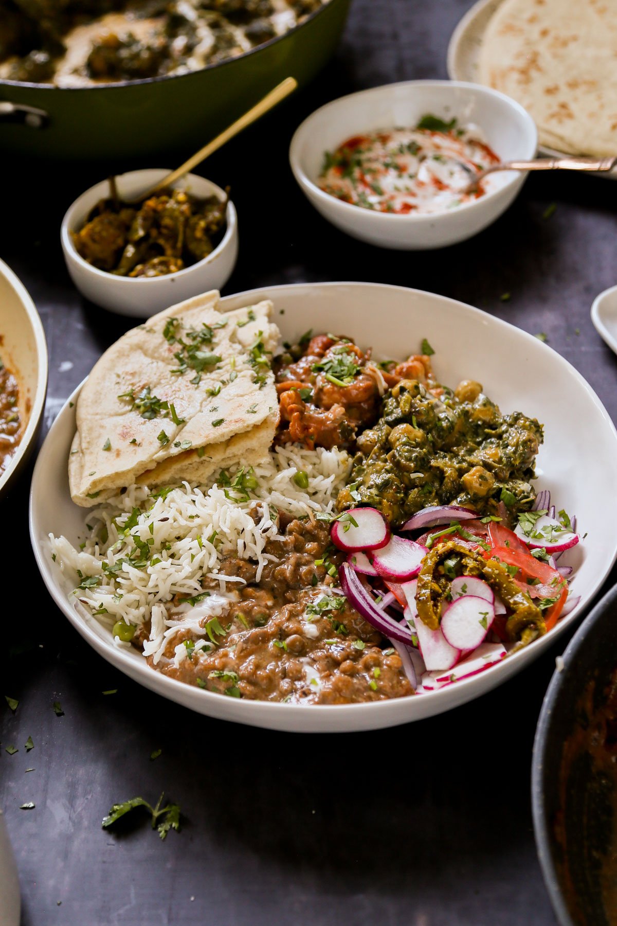 plateful of food from the diwali party menu with flatbread on the side