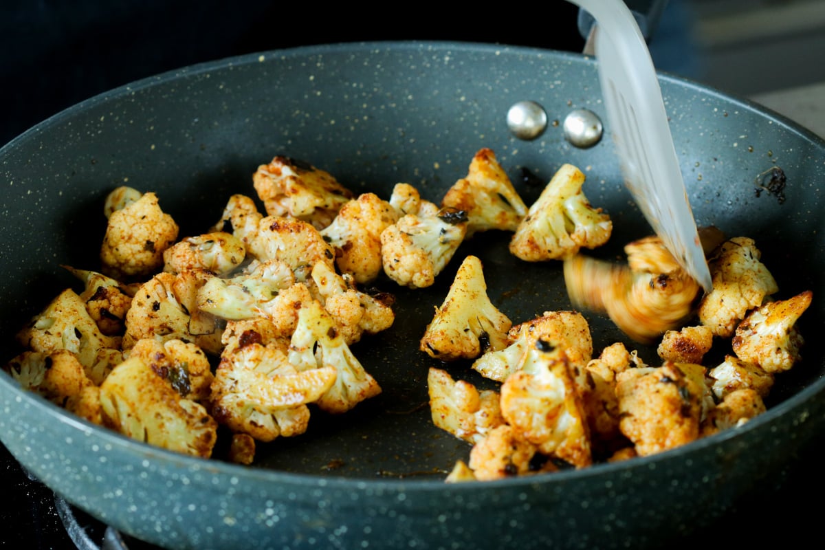 cauliflower and spices in the pan, after cooking
