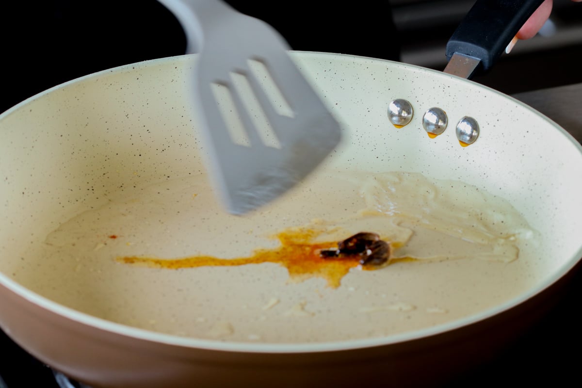 toasting the whole spices in the pan