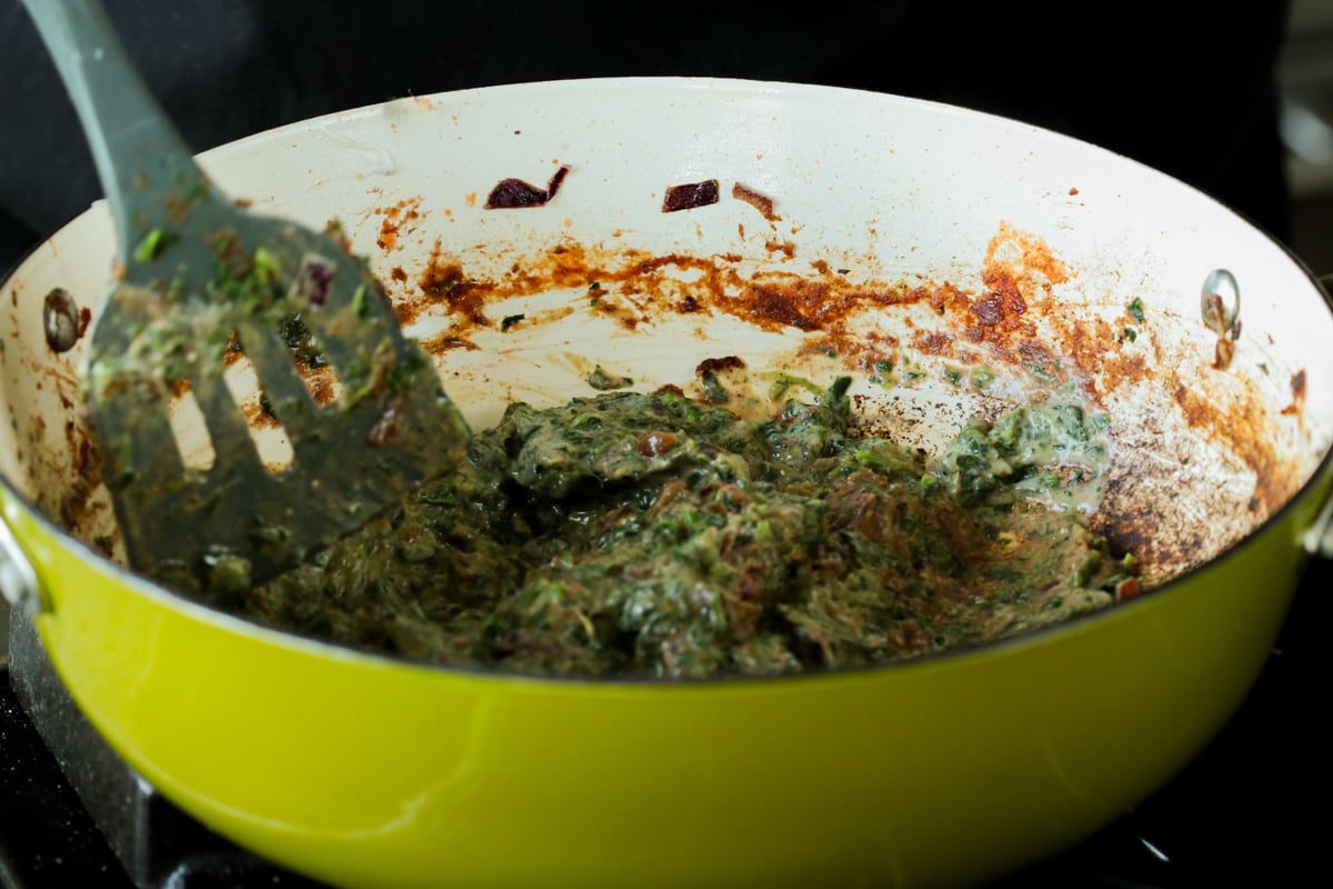 spinach after stirring in the yogurt mixture