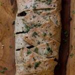 gluten-free vegan beef Wellington on a cutting board after baking