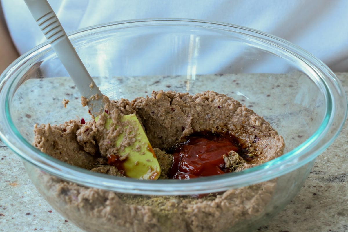 adding sauces to the lentil mixture