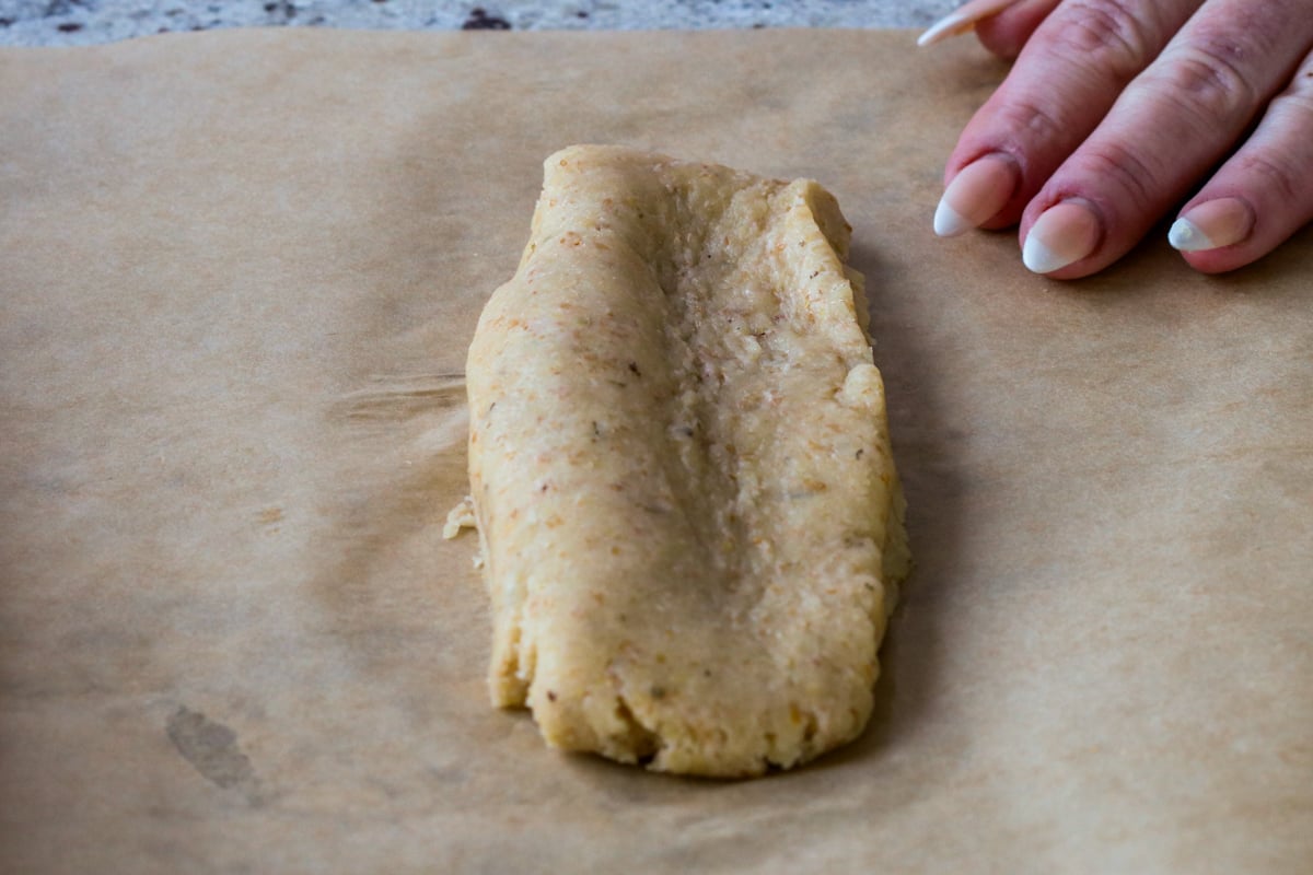 transferring half the dough to parchment paper