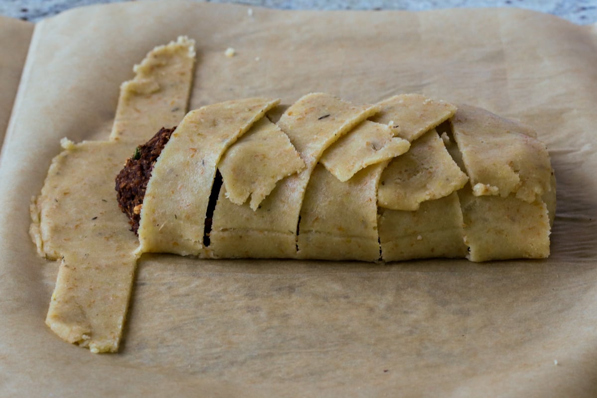 loaf almost done wrapping in the gluten-free dough