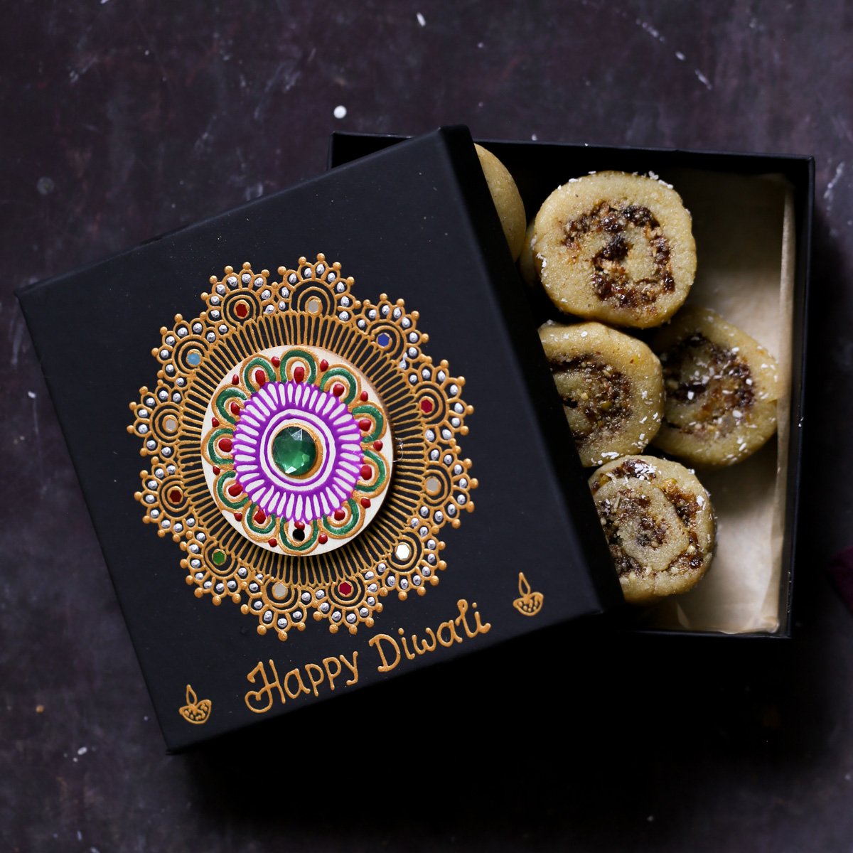 gujiya peda in a Diwali gift box that's half closed