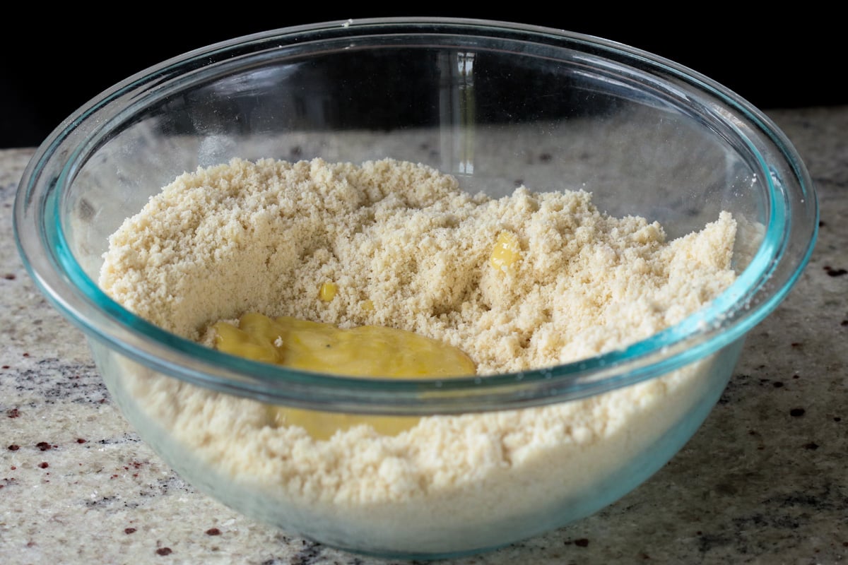adding custard to the almond flour mixture