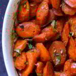 close-up of spiced glazed carrots in the baking dish