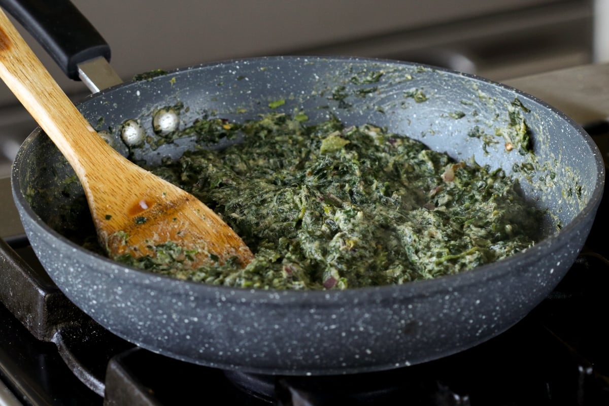 spiced spinach in the pan after cooking