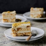 slices of kulfi tiramisu on white plates