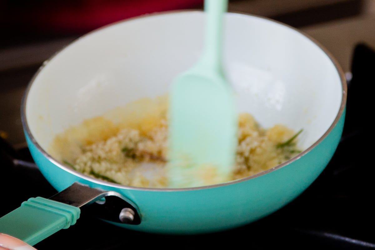 stirring breadcrumbs into the garlic-rosemary mixture