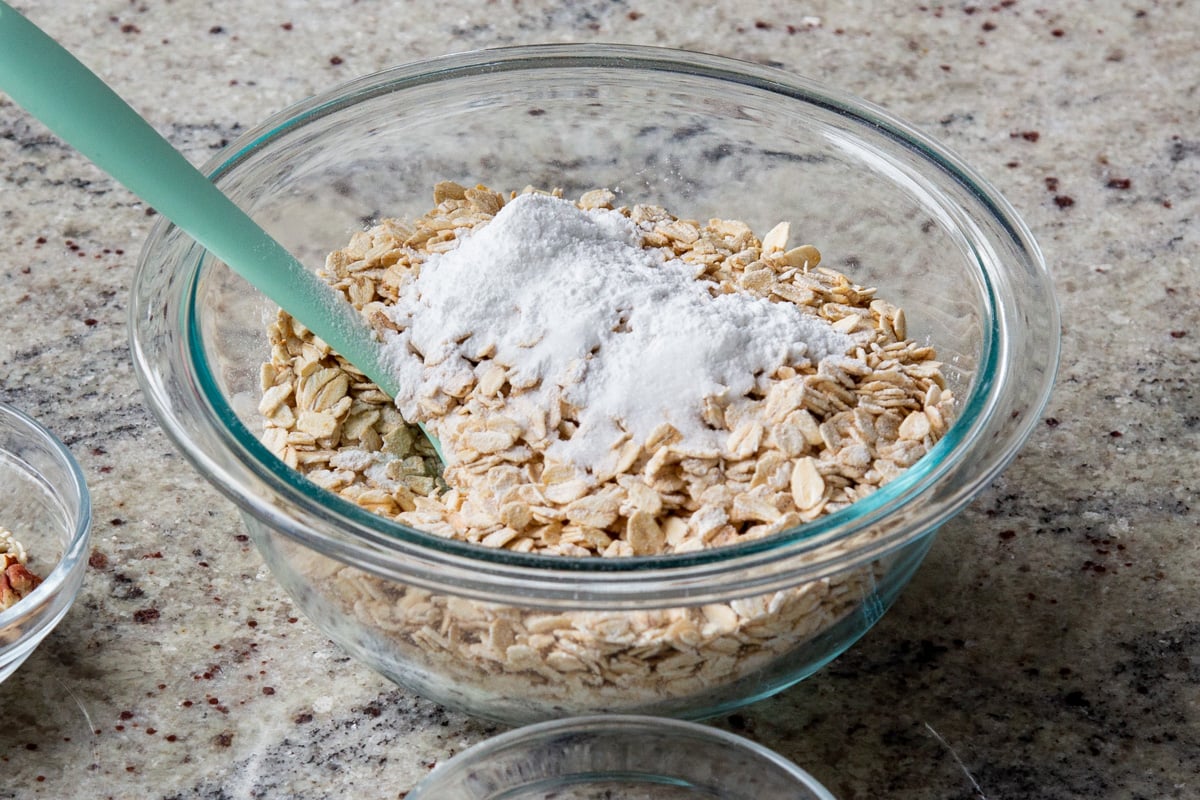 adding baking powder and salt to the bowl