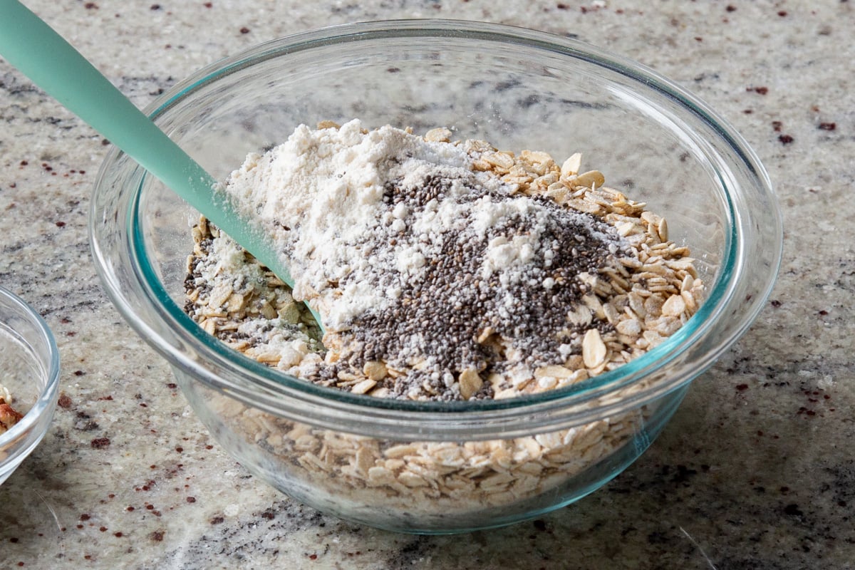 adding flour and chia seeds to the bowl