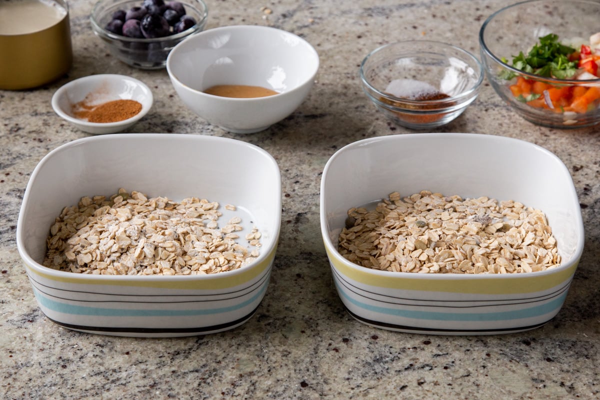 dry oats mixture measured into 2 baking dishes