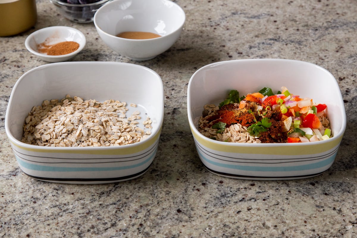 savory baked oats ingredients added to the pan of dry oats mix