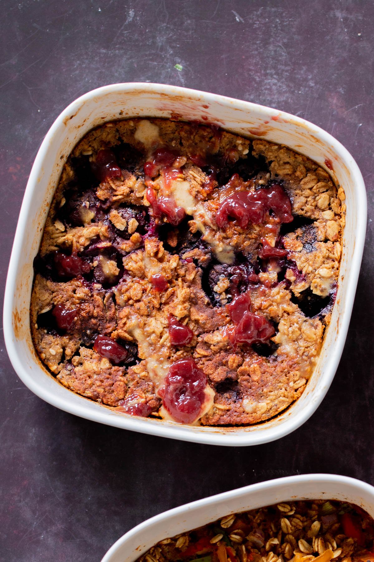 peanut butter and jelly baked oatmeal in the baking pan after baking