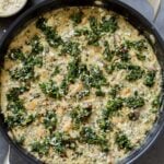 vegan white bean mushroom alfredo in the pan with spinach