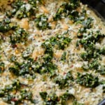 close-up of vegan white bean mushroom alfredo in the pan with spinach