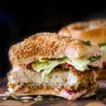 close-up of a vegan chicken sandwich with a bite taken out