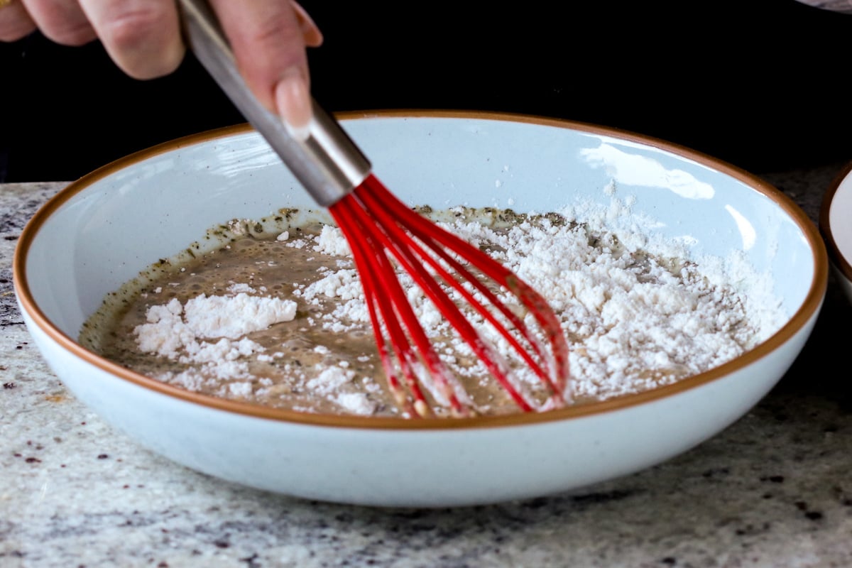 mixing the batter ingredients in a bowl