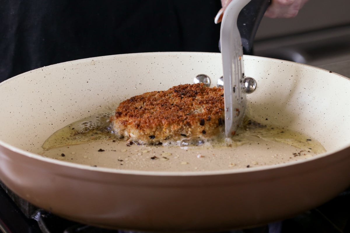 crispy vegan chicken cutlet in the frying pan