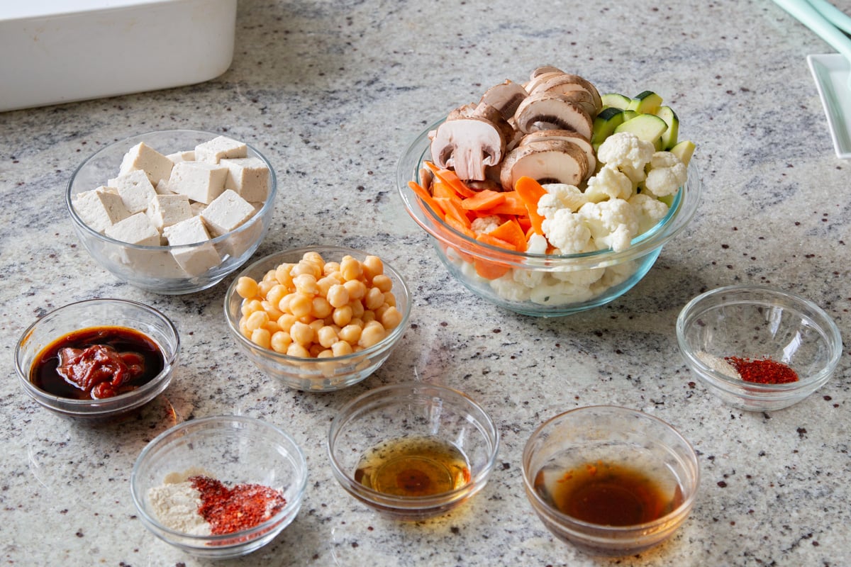 tofu, gochujang, and other gochujang bowl ingredients in bowls on the kitchen counter
