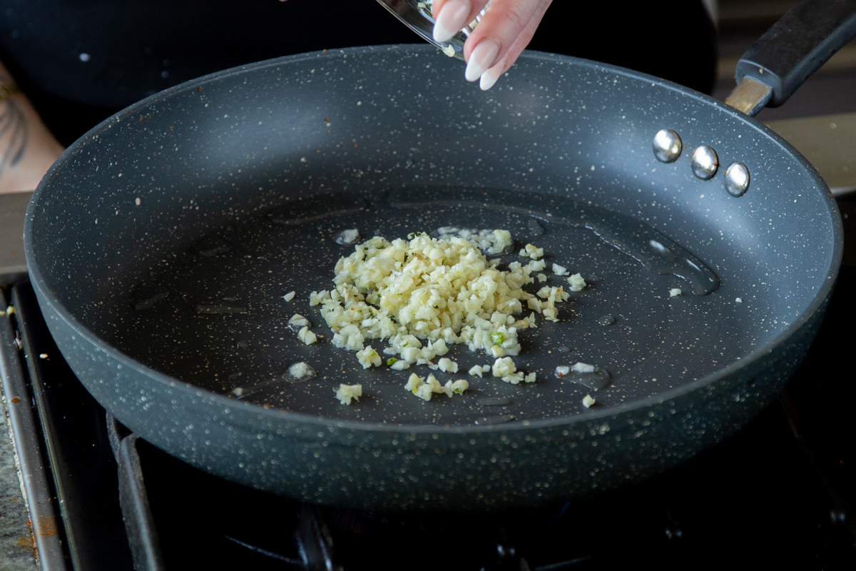 garlic in the pan before cooking