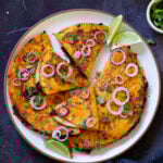 mushroom quesatacos cut up on a plate, so you can see the filling better