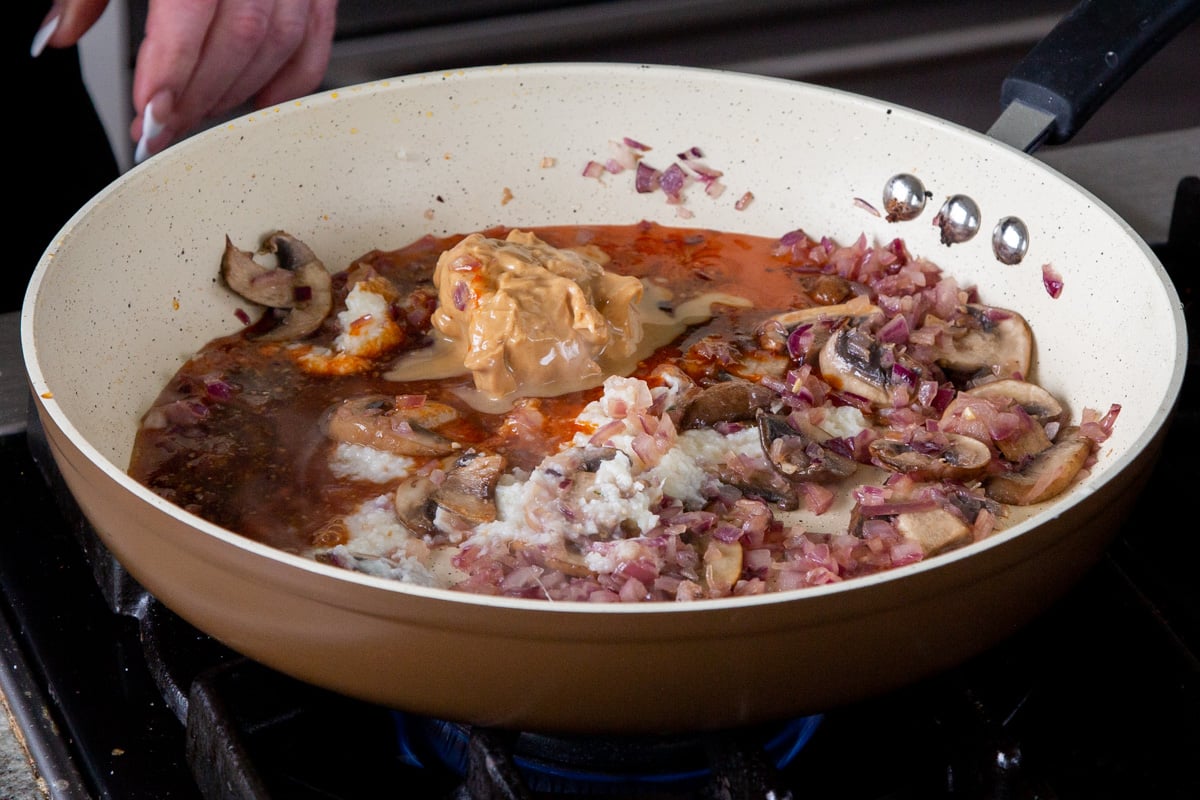 adding peanut butter to the pan