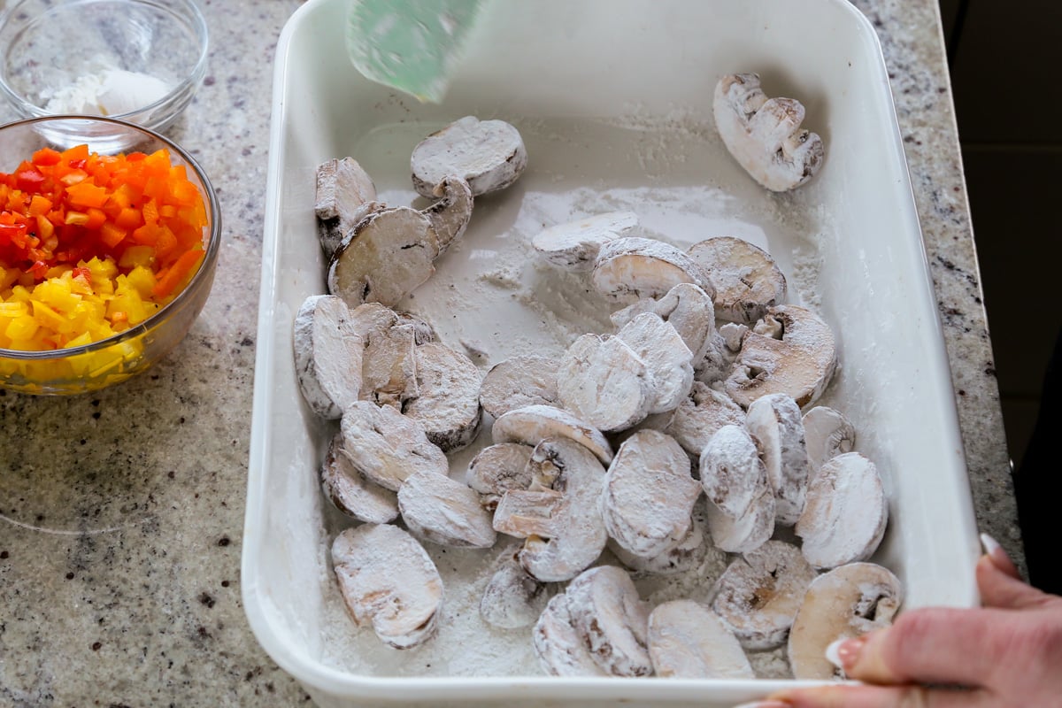mushrooms after tossing in the cornstarch mixture