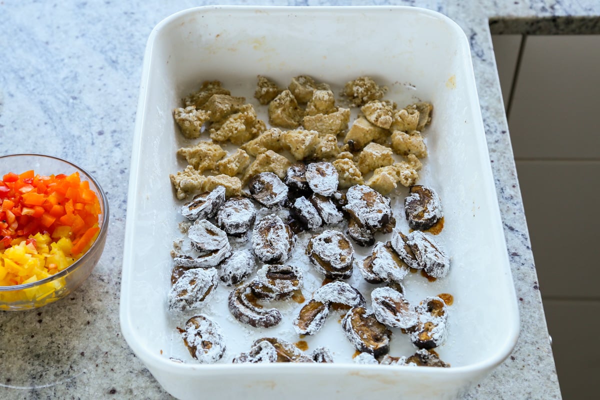 mushrooms and tofu after tossing in the sesame oil and the cornstarch mixture and baking