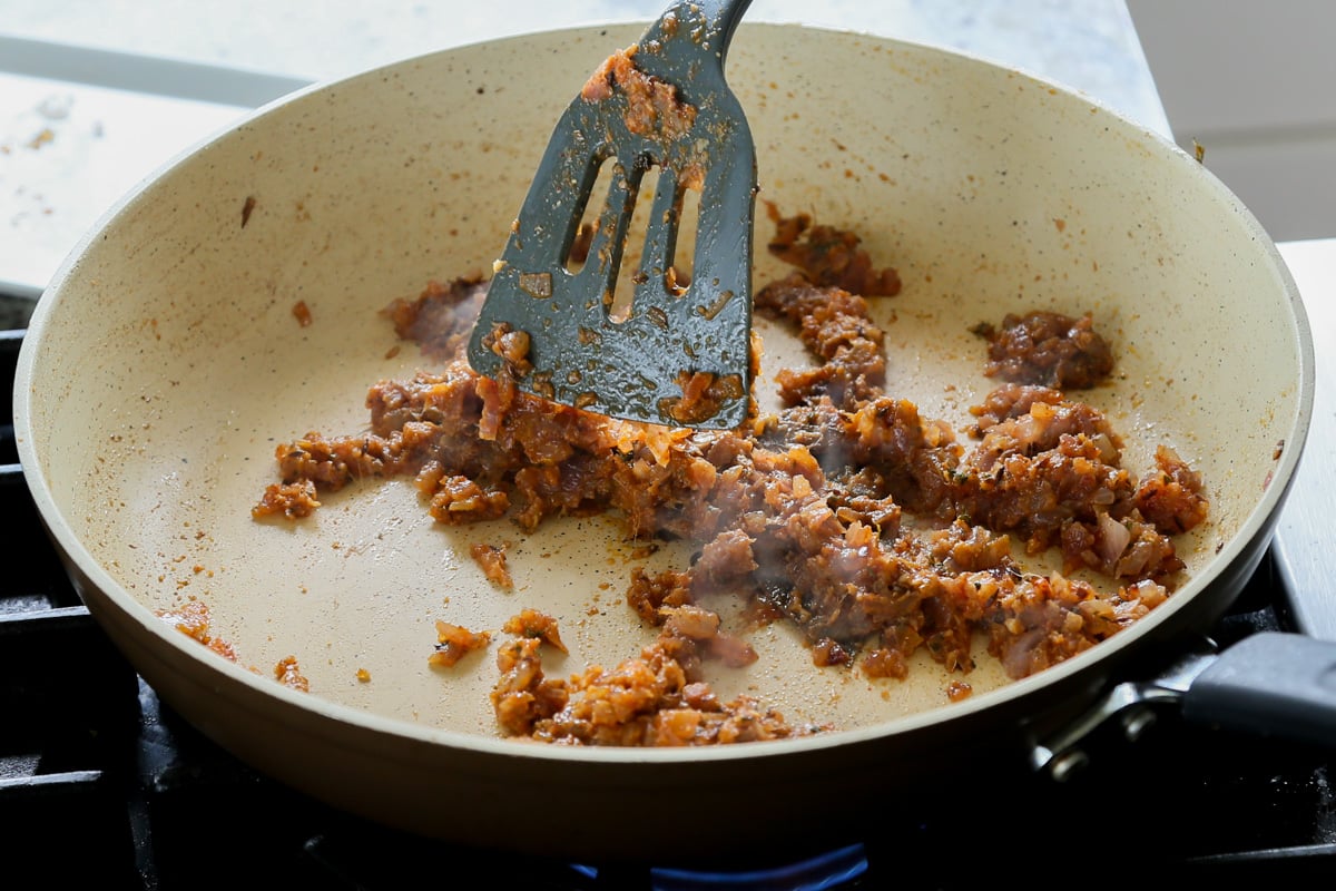 mixing in the dried spices and onion