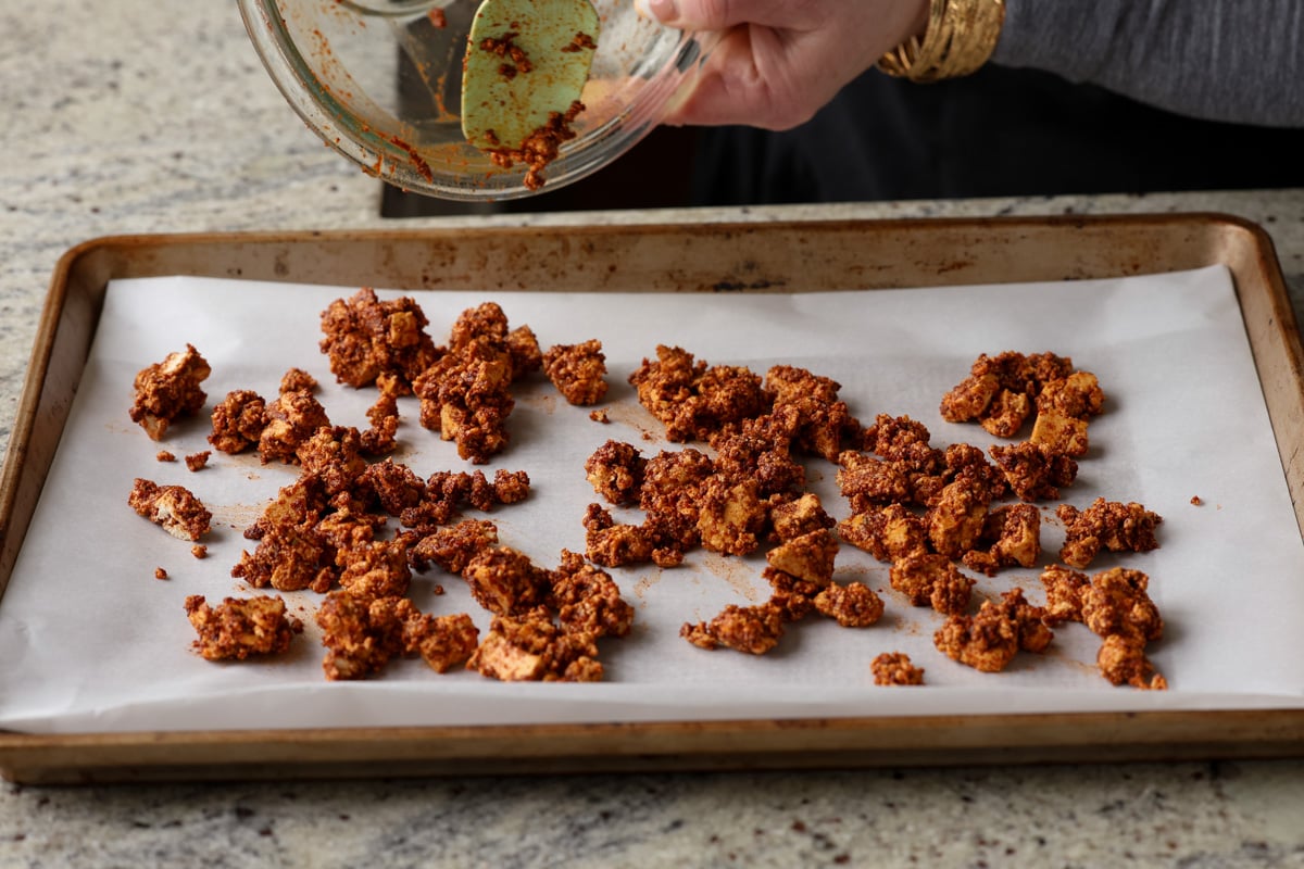 tofu chorizo after tossing in seasonings and spreading onto the baking sheet