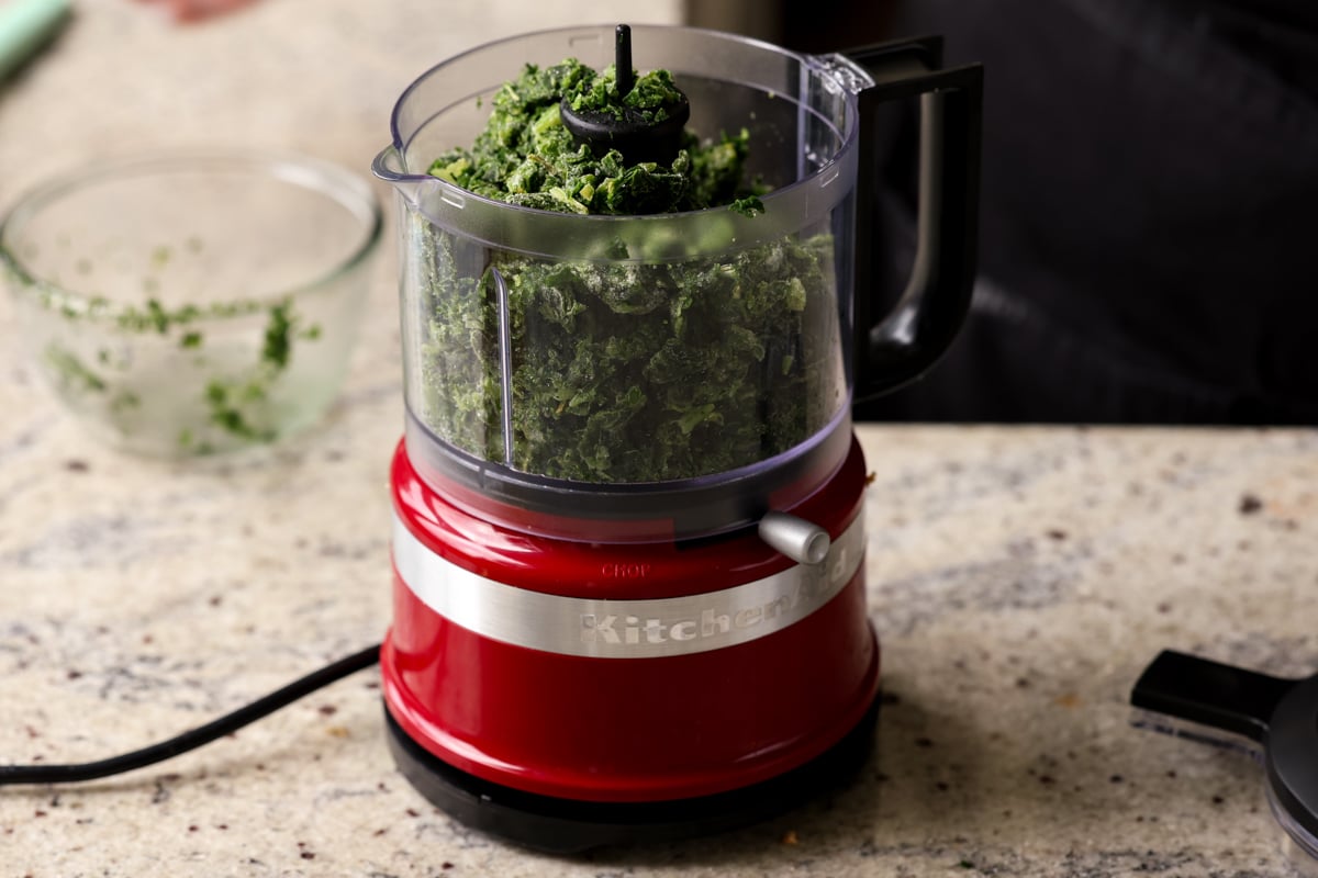 frozen spinach in the food processor, before pulsing