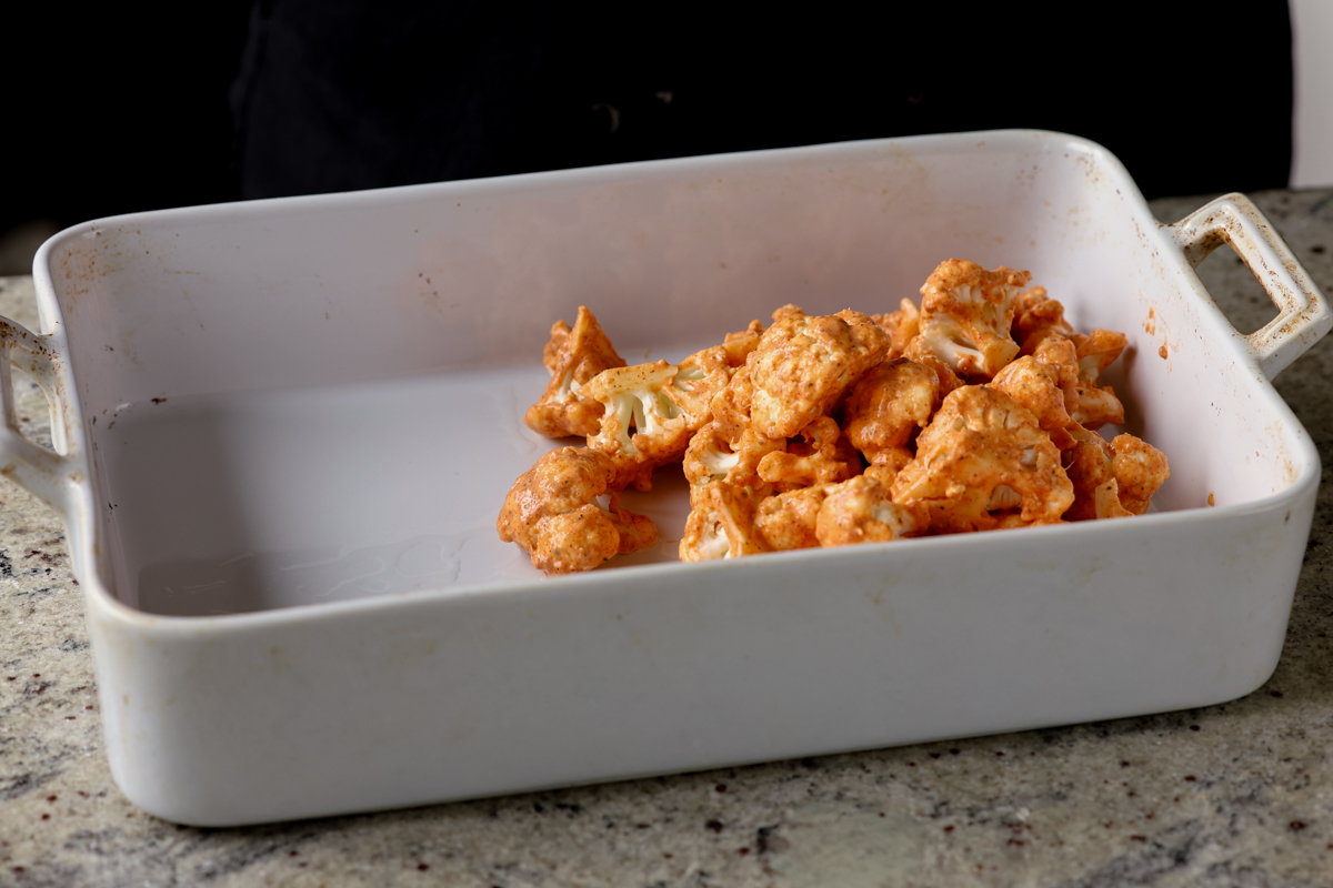 battered cauliflower in the pan