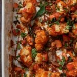 close up of cauliflower pepper fry in the pan after baking and mixing together