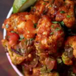 close-up of cauliflower pepper fry in a bowl