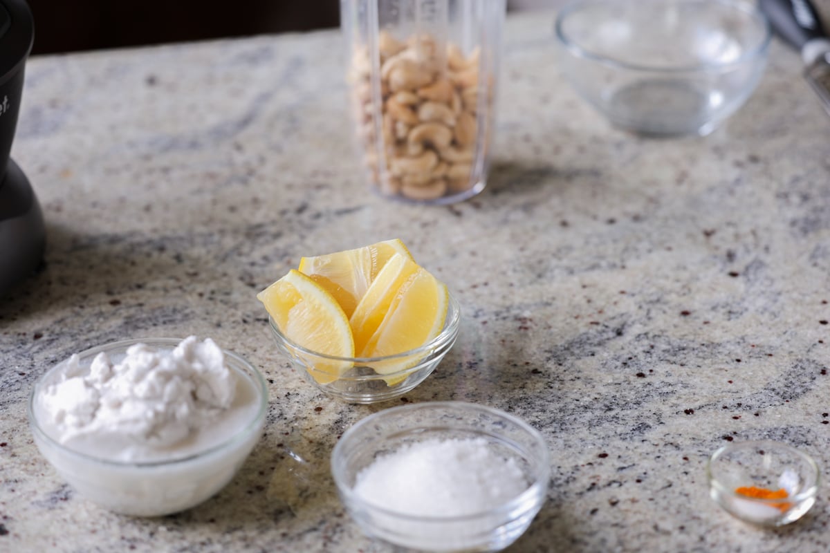 frosting ingredients in bowls on the kitchen counter