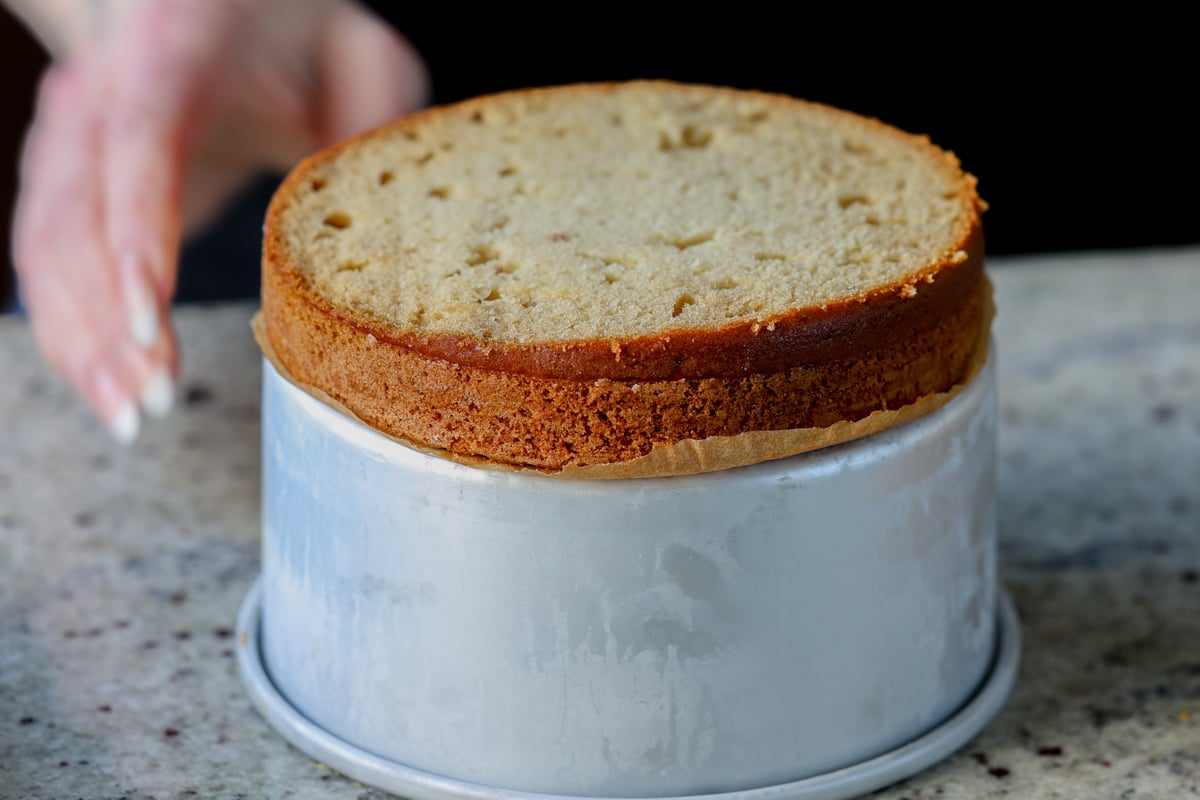 first cake layer with the top sliced off