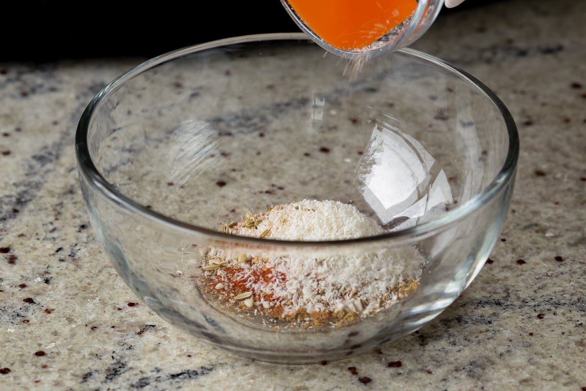 making the spice mix in a glass bowl