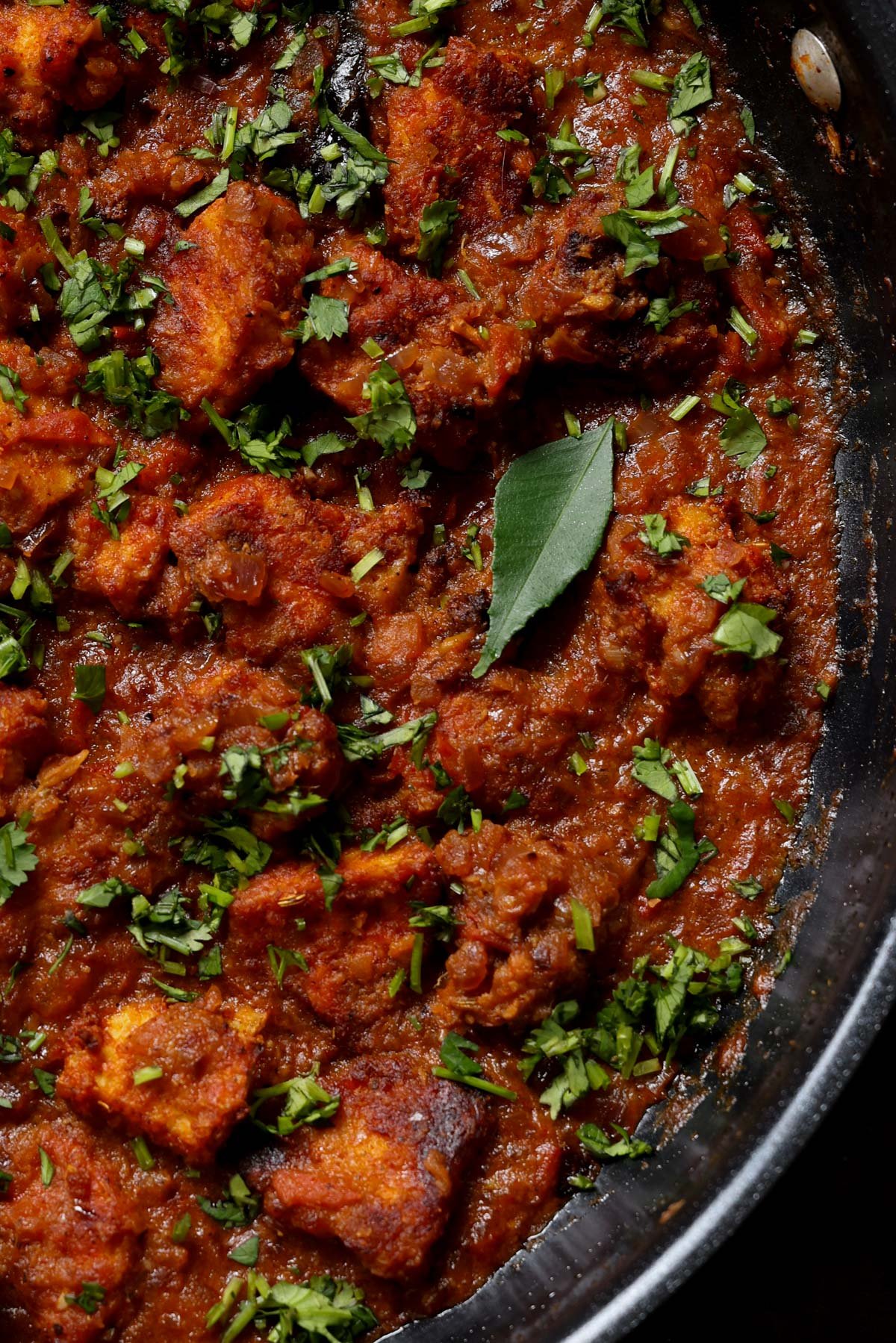 close-up of Madurai Chicken Curry in the pan after cooking