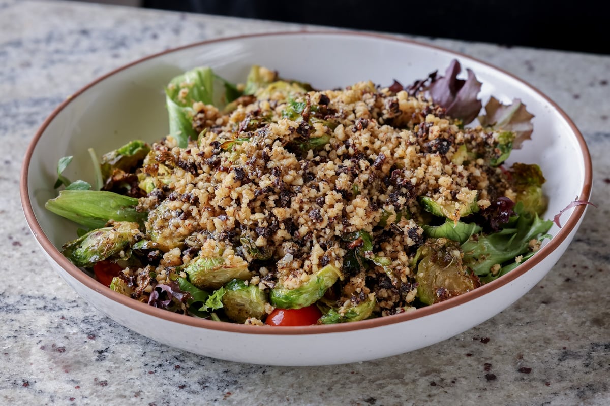 walnut crumble on top of the salad before mixing in