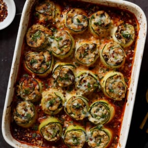 zucchini rolls in the baking dish after baking