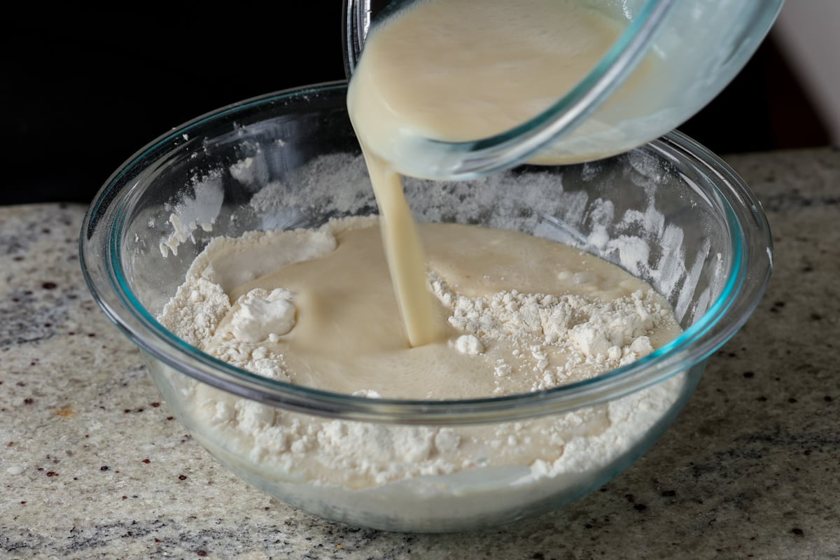 adding wet ingredients to the dry