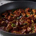 close-up of malabar eggplant in the pan