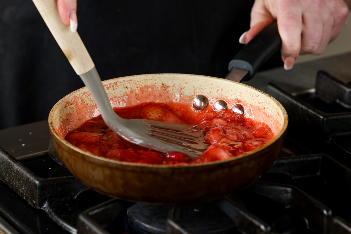 strawberry compote cooking in the pan