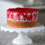 strawberry mousse cake on the cutting board