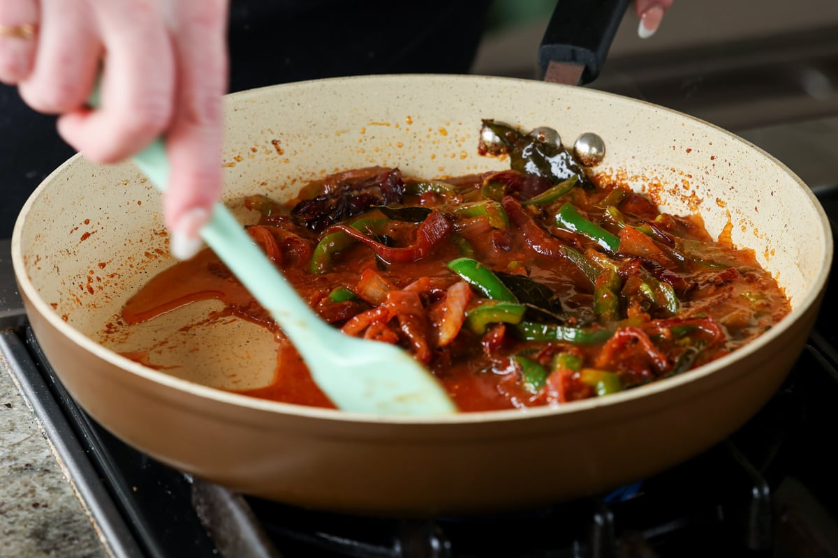 adding sauces to the pan