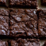 sliced almond butter brownies on the cutting board
