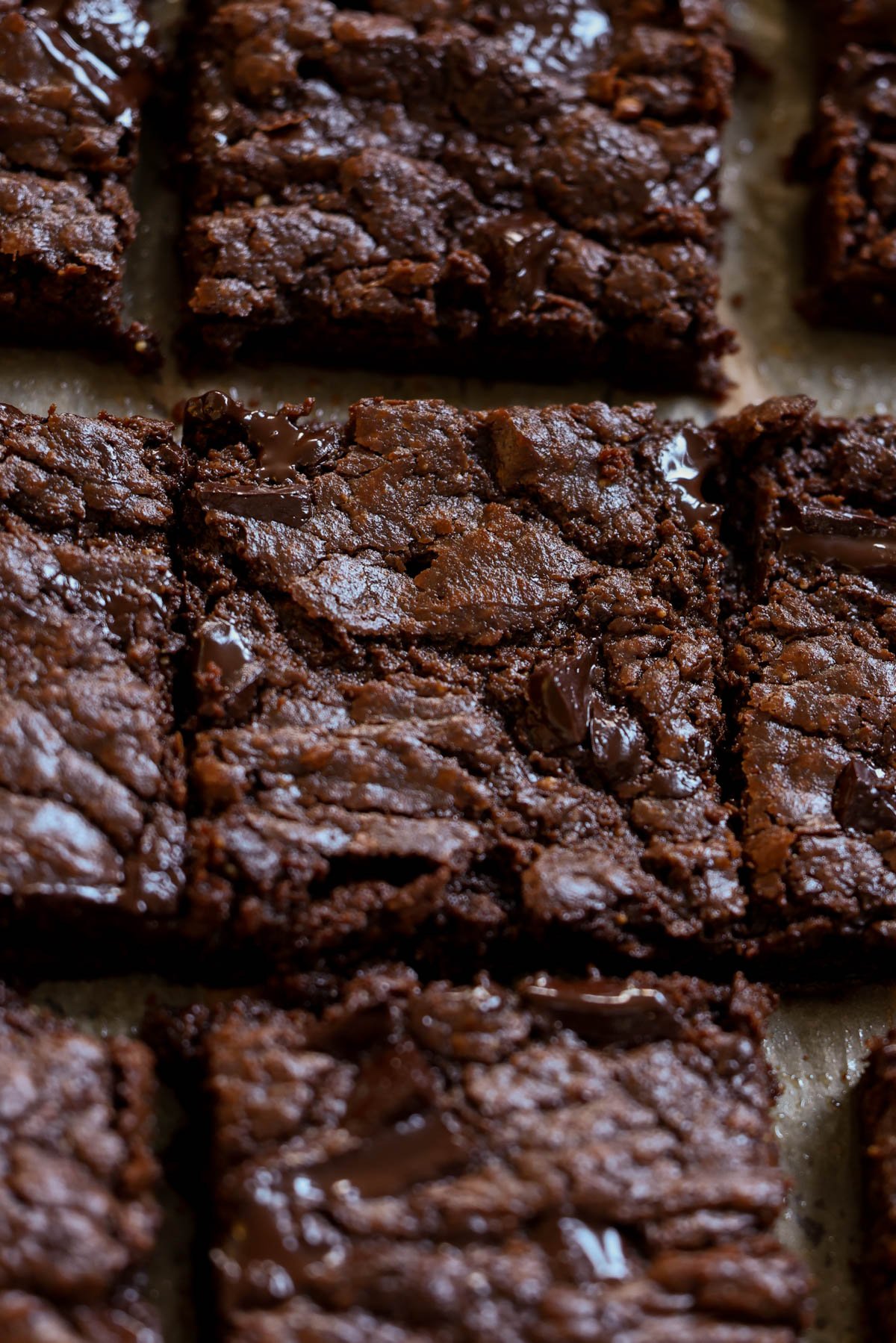 sliced almond butter brownies on the cutting board